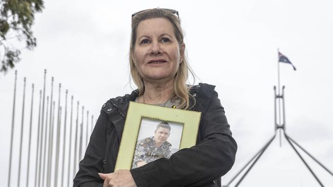 The mother of Dave Finney, Julie-Ann Finney. Australian veterans gather outside Parliament House in Canberra to petition for a royal commission into suicides among veterans and defence personnel. Picture: NCA NewsWire / Gary Ramage