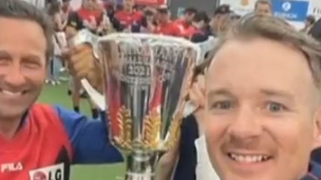 Hayden Burbank and Mark Babbage in the Melbourne rooms after the Grand Final win. Picture: Channel 7