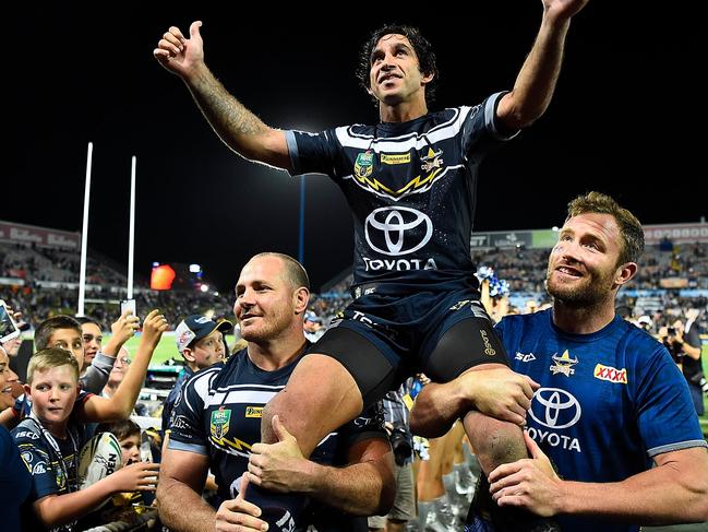 TOWNSVILLE, AUSTRALIA - AUGUST 24:  Johnathan Thurston of the Cowboys is chaired from the ground after playing his last home NRL match during the round 24 NRL match between the North Queensland Cowboys and the Parramatta Eels at 1300SMILES Stadium on August 24, 2018 in Townsville, Australia.  (Photo by Ian Hitchcock/Getty Images)