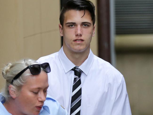 Bradley Brooks pictured being led into a prison truck from the King St Courts.Haydar haydar Bradley Brooks who is in custody is on trial charged with murdering popular Wyong footballer Greg Gibbons at a central coast dance party. Picture: Christian Gilles