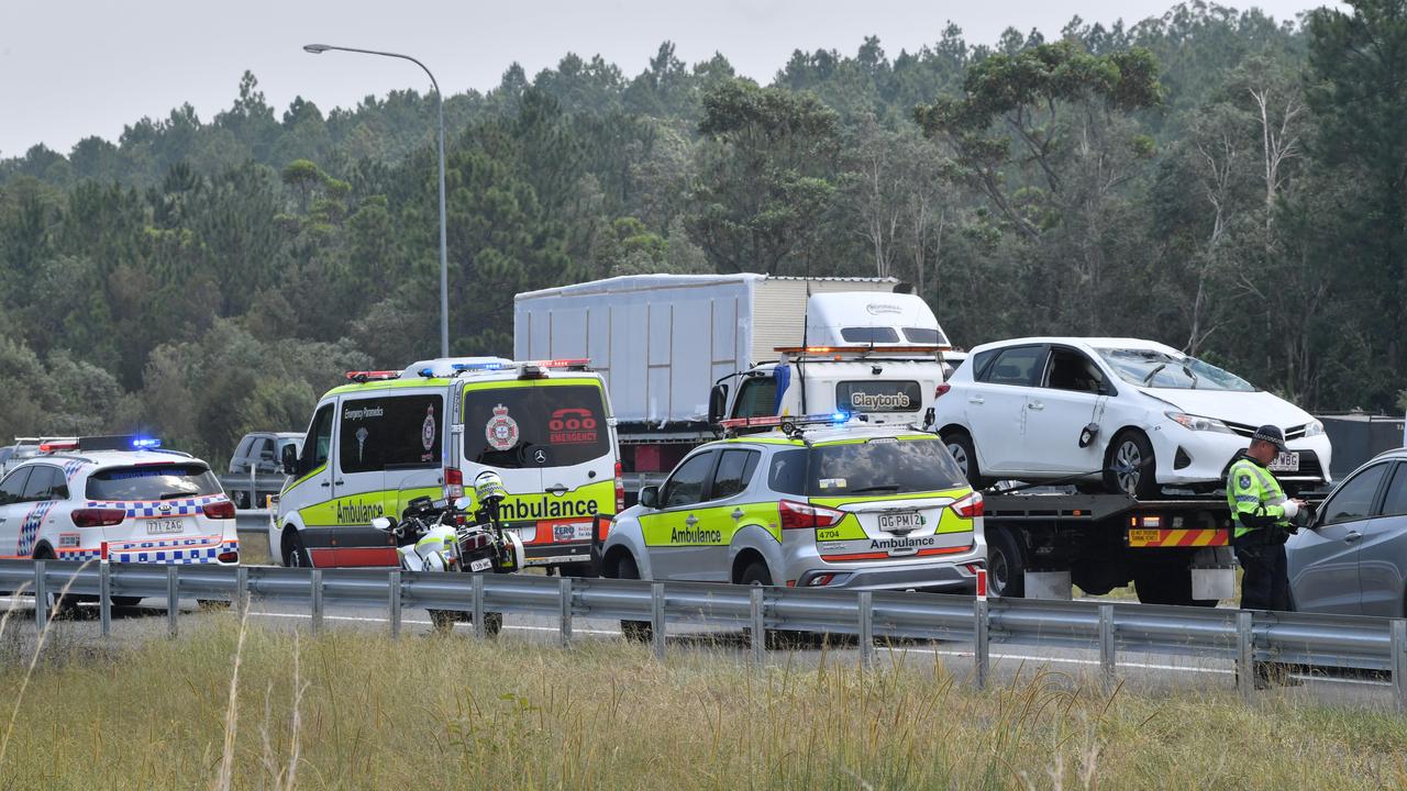 Police apprehended a man and woman at gunpoint after they led emergency services on a car chase from Hervey Bay to the Glasshouse Mountains. The alleged stolen car ended up on its roof and the occupants were taken into custody. Photo: John McCutcheon / Sunshine Coast Daily