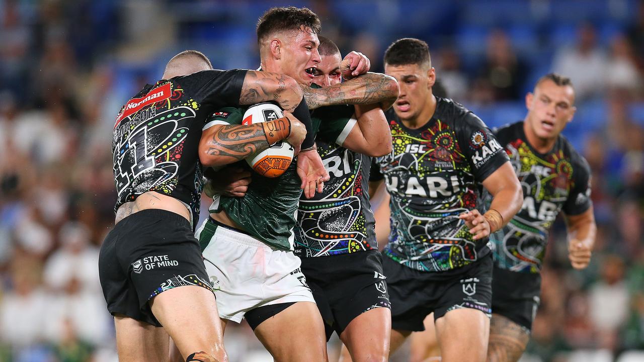 Jordan Riki tries to roll through the Indigenous All-Stars defence. Picture: Jason McCawley/Getty Images)