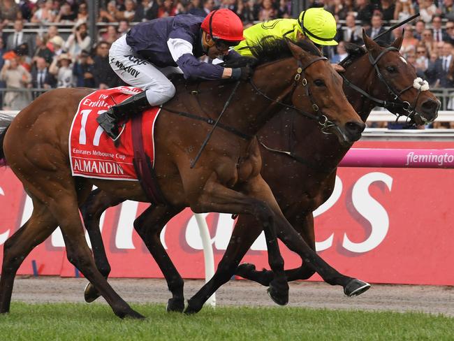 Kerrin McEvoy and Almandin (red cap) edge out Joao Moreira and Heartbreak City to win last year’s Melbourne Cup. Picture: Getty Images