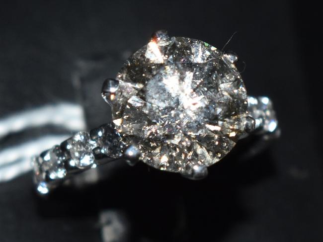 Small & Whitfield auction - 18ct white gold diamond solitaire ring with 4.54ct central diamond surrounded by 8 diamonds