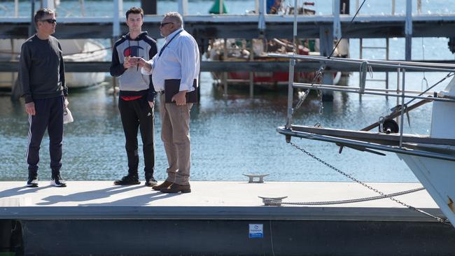 A man has been pulled from the water in Solomontown this morning, prompting a police investigation into the death. Nephew(C), of the drowned man, talking to detectives. Police at the scene, including divers searching the water. 17 August 2024. Picture: Dean Martin