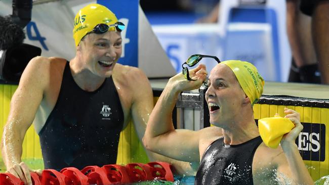 Bronte Campbell (right) of Australia celebrates as her sister Cate offers congratulations on her 100m freestyle victory. Photo: AAP