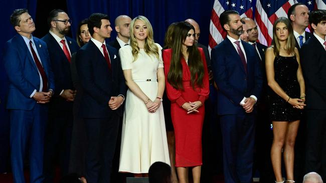 Tiffany Trump and her husband Michael Boulos, Kimberly Guilfoyle, her partner Donald Trump Jr. and his his daughter Kai Madison Trump on stage.