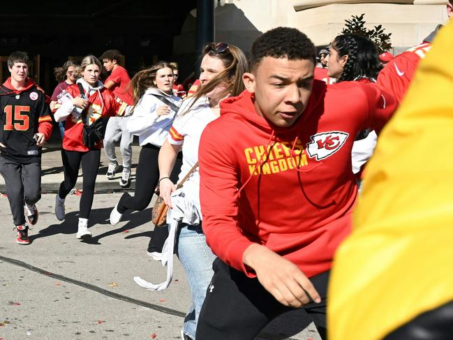 People flee after shots were fired near the Kansas City Chiefs' Super Bowl LVIII victory parade. Picture: AFP