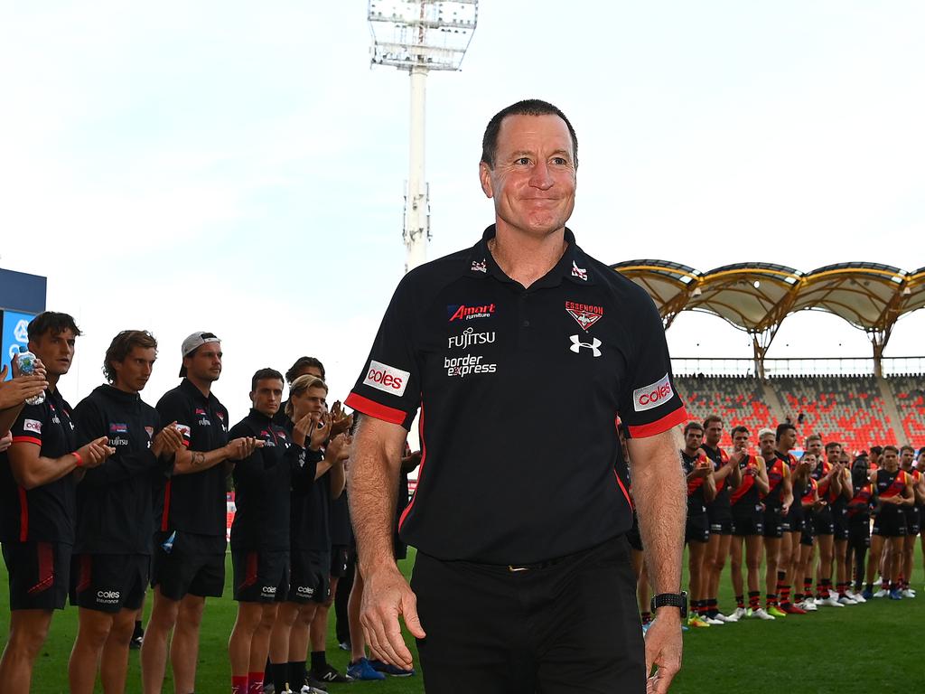 Bombers head coach John Worsfold walks off the field in his last game.