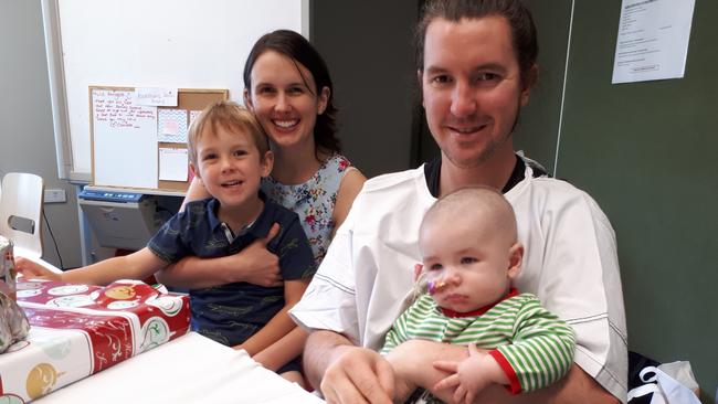 Parents Emma and Chris with sons Blake and baby Max. Blake donated bone marrow to Max to deal with his immune disease. Picture: supplied by family