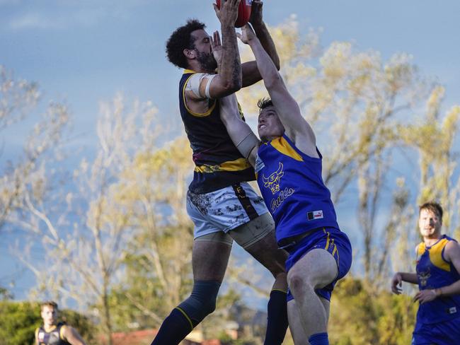 EFL: Doncaster East’s Zac Clarke marks over Jack Francis of Noble Park. Picture: Valeriu Campan