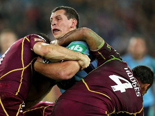 State of Origin II, 2012: NSW second-rower Greg Bird is tackled.