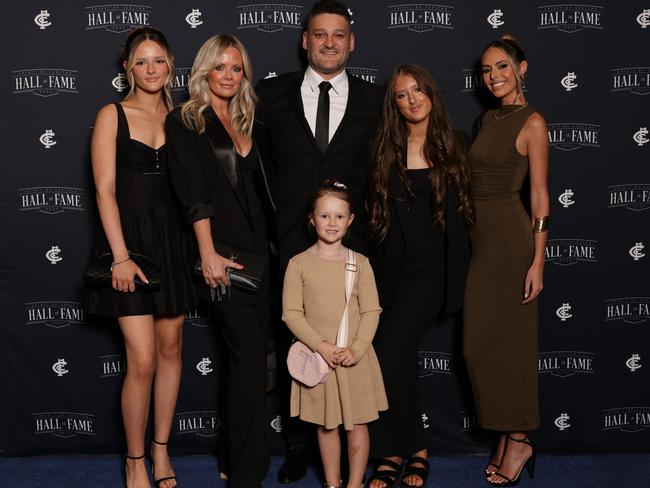 Mia Fevola, far right, with stepdad Brendan Fevola (centre), her mother Alex (second from left) and sisters Leni, Lulu, and Tobi on the night Brenadan was inducted into Carlton’s Hall of Fame. Picture: Supplied