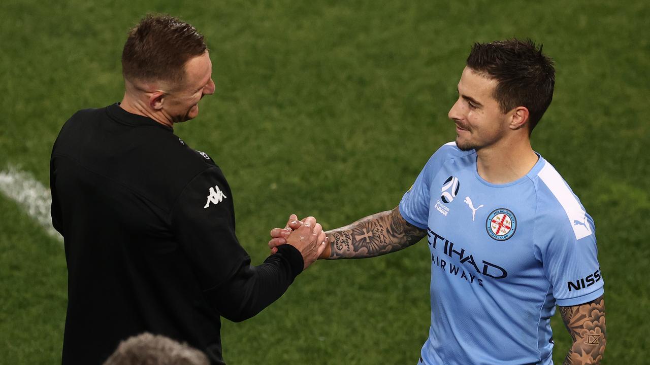 Besart Berisha (left) congratulates Jamie Maclaren on his Golden Boot success. Picture: Ryan Pierse/Getty Images