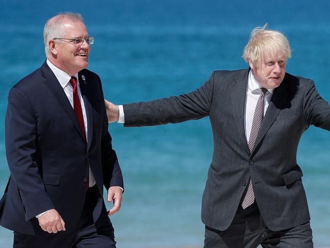 Britain's Prime Minister Boris Johnson greets Australia's Prime Minister Scott Morrison at the official welcome during the G7 summit in Carbis Bay, Cornwall. Picture: AFP