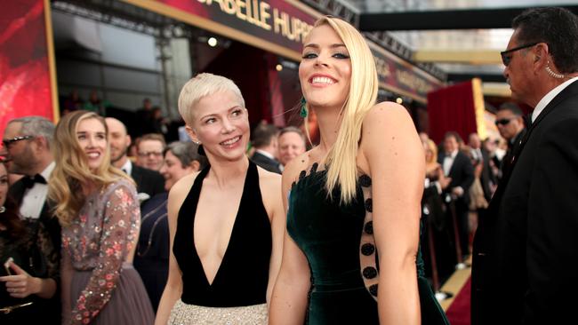 Michelle Williams, left, alongside Busy Philipps, is once again in Louis Vuitton. No surprises there. But this is not their best collaboration. Picture: Getty