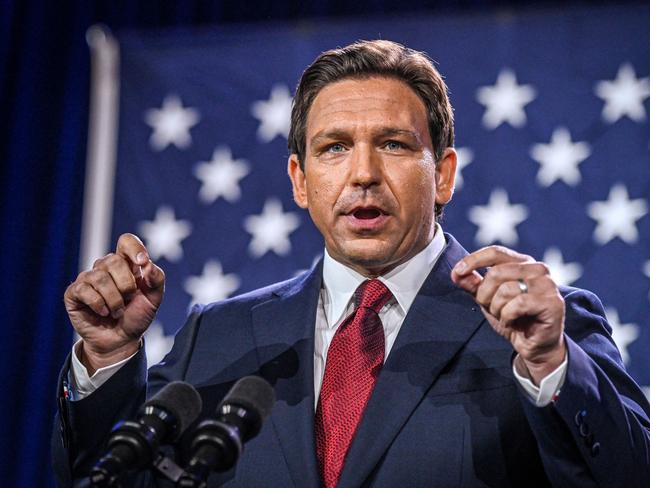 (FILES) In this file photo taken on November 8, 2022, Florida Governor Ron DeSantis speaks during an election night watch party at the Convention Center in Tampa, Florida. - Florida Governor Ron DeSantis has taken his most direct shots yet at rival Donald Trump, with the gloves finally coming off in what is widely expected to be the head-to-head for the 2024 Republican presidential nomination. (Photo by Giorgio VIERA / AFP)