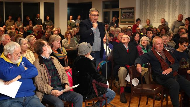 Michael Figg asks a question at the public meeting at the Rosny Park Bowls Club. Picture: SAM ROSEWARNE