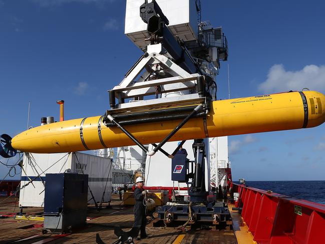 The Phoenix International Autonomous Underwater Vehicle (AUV) Artemis is craned over the side of Australian Defence Vessel Ocean Shield in the search for missing Malaysia Airlines flight MH 370. *** Local Caption *** Joint Task Force 658 has been established by the ADF to coordinate supporting military forces engaged in the search for missing Malaysia Airlines flight MH370.  Under the name Operation SOUTHERN INDIAN OCEAN, ADF assets from the Royal Australian Navy and Royal Australian Air Force have joined the search for debris, recovery and investigation of the missing flight.