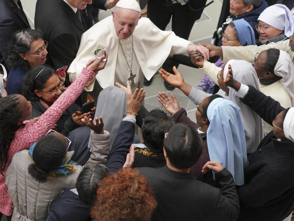 Pope Francis is greeted by a group of nuns during the weekly general audience he held at the Vatican last month. Picture: AP Photo/Andrew Medichini