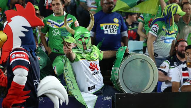 Raider fan Simon Tayoun and his famous drum. Picture: Jonathan Ng