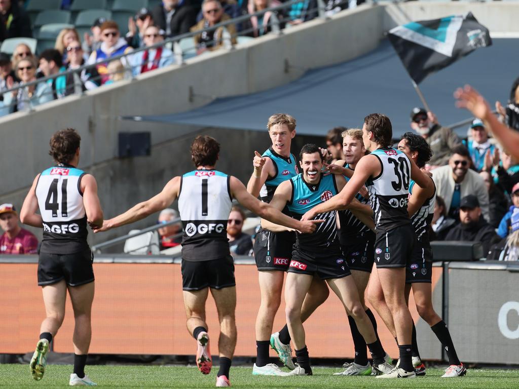 Josh Sinn after kicking a goal against Brisbane last year. Picture: James Elsby/AFL Photos via Getty Images