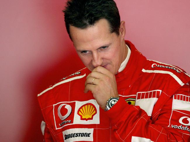 (FILES) In this file photo taken on October 12, 2006 seven-time world Formula One champion Michael Schumacher ponders during a training session at the Jerez recetrack. - Absolute reference of the Formula 1, Michael Schumacher, will turn 50 years old on January 3, 2019. The seven-time world champion was victim five years ago, on December 29, 2013 of a ski accident, leaving him in a precarious state of health. The family never wanted to communicate on the matter but according to renowned neurologists, the German pilot, technically out of the coma, might be in a vegetative state. (Photo by JOSE LUIS ROCA / AFP)