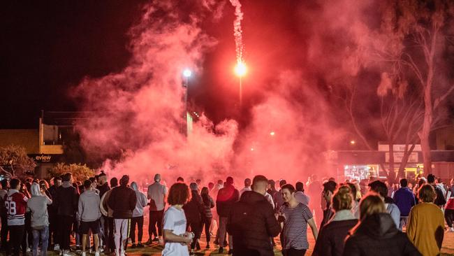 Schoolies at Rye throw flares last year. Picture: Jason Edwards