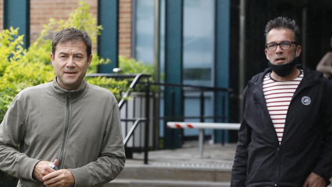 Theo Hayez' godfather Jean-Philippe Pector and father Laurent Hayez leave Byron Bay Court House for the sixth day of the inquest into Theo's 2019 disappearance. Picture: Liana Boss