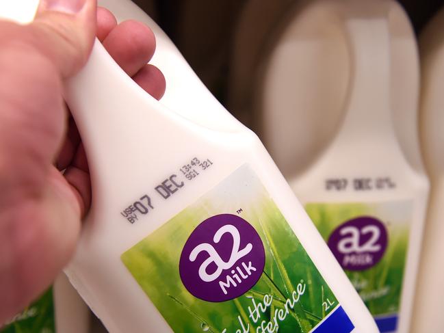 Bottles of A2 milk are displayed in a fridge in Sydney on Tuesday, Nov. 22, 2016. The A2 Milk Company will today be holding their Annual General Meeting. (AAP Image/Paul Miller) NO ARCHIVING