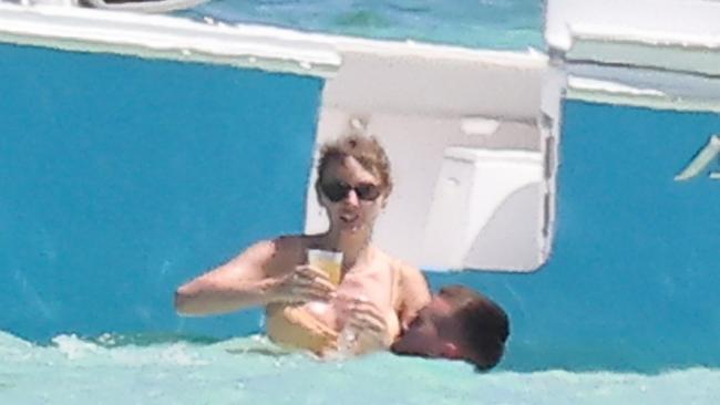 The couple were seen enjoying drinks as they laughed and joked together in the ocean. Picture: Backgrid