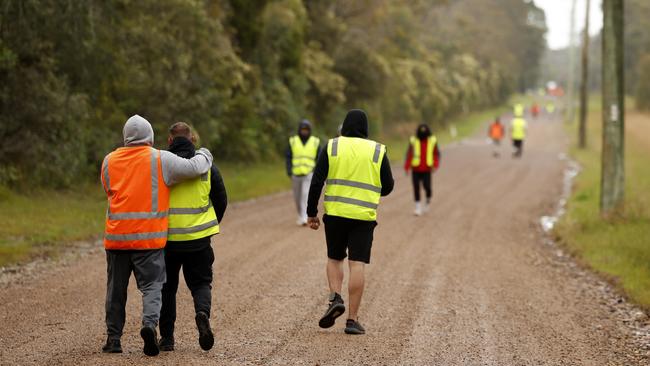 Residents start their day with an early-morning walk. Picture: Jonathan Ng