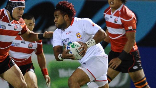 Tonga's scrum-half Taniela Moa runs with the ball during the 2011 Rugby World Cup. Photo: AAP Image/AFP, Philippe Lopez