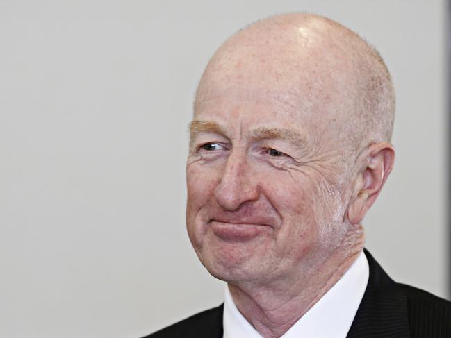 15/08/16 Governor of the Reserve Bank Glenn Stevens in the corridor where all the past Governors portraits hang at the Reserve Bank. Governor Glenn Stevens is stepping down in September this year form his role at the Reserve bank. Adam Yip/The Australian