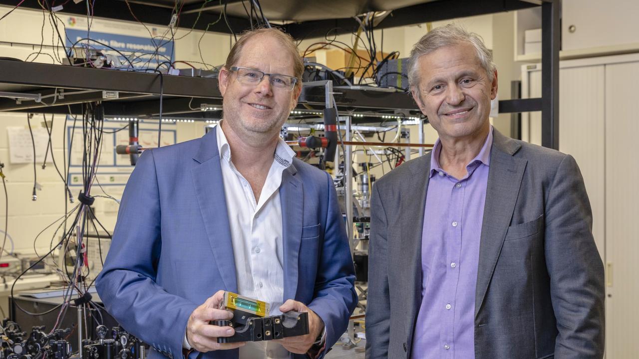 QuantX founder and managing director Andre Luiten (left) with SmartSat CRC chief executive Professor Andy Koronios. Picture: Supplied by SmartSat CRC