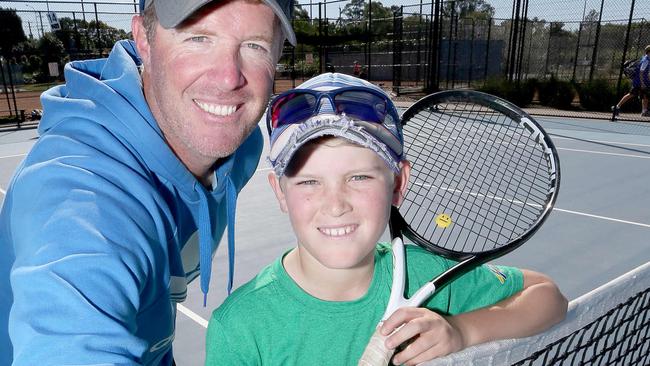 Jamie Atkinson and His son Cody Atkinson who won the tournament on the Gold Coast. Pic Mike Batterham