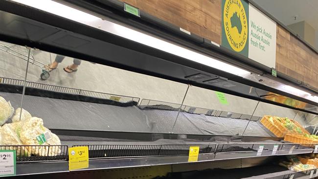 Near empty fruit and veg shelves at Woolworths in Gordon.