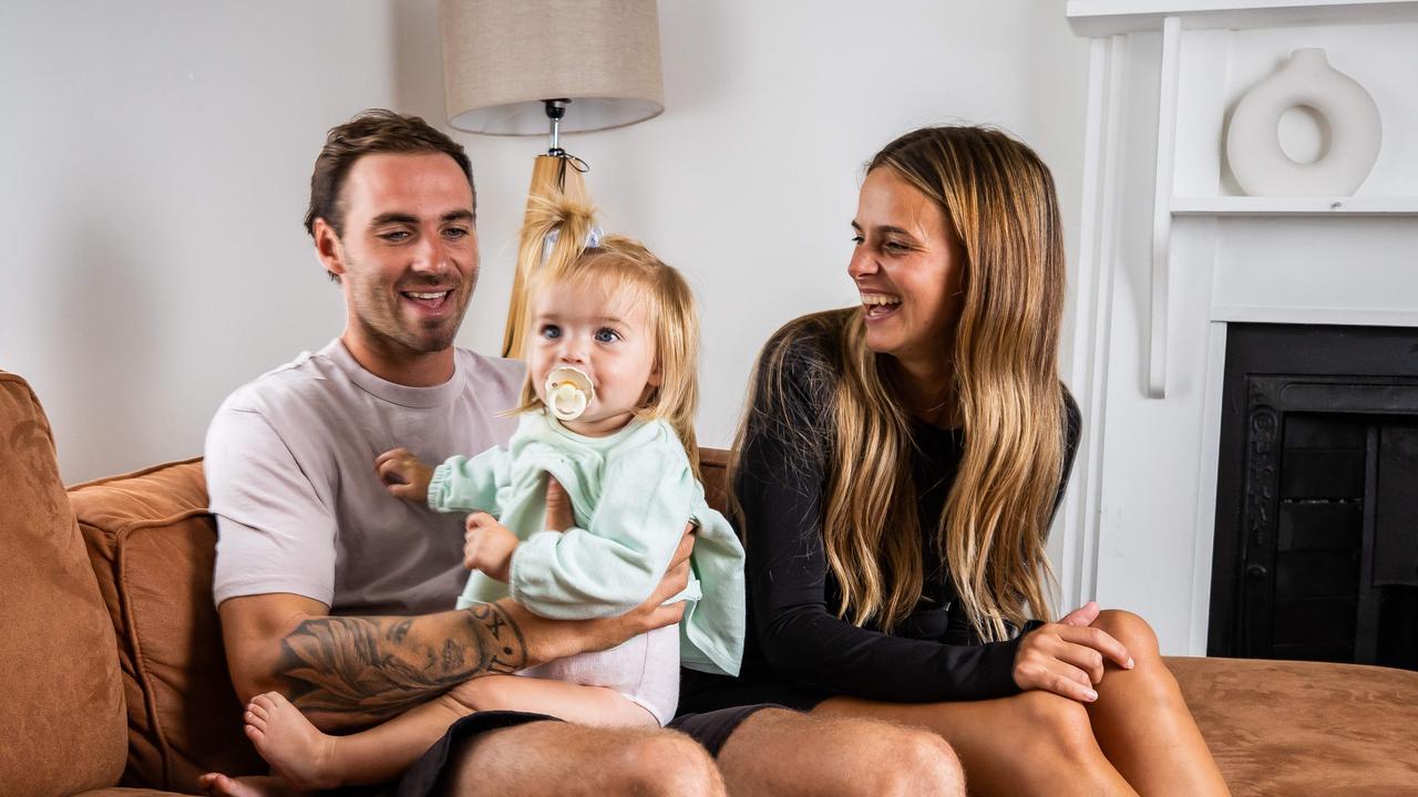 Port Adelaide star Jeremy Finlayson, his fiance Kellie Gardner and their daughter Sophia. Picture: Tom Huntley