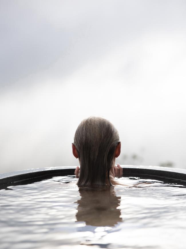 The Keep's deep granite outdoor bath is another great spot to take in the property's mesmerising view. Picture: Aaron Jones