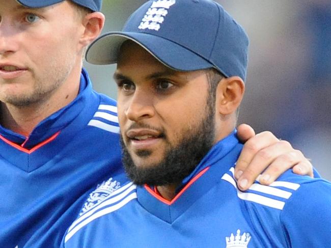 England's Joe Root and Adil Rashid , right, leave the field after England beat New Zealand by 210 runs after the One Day International match between England and New Zealand at Edgbaston cricket ground in Birmingham, England, Tuesday, June 9, 2015. (AP Photo/Rui Vieira)