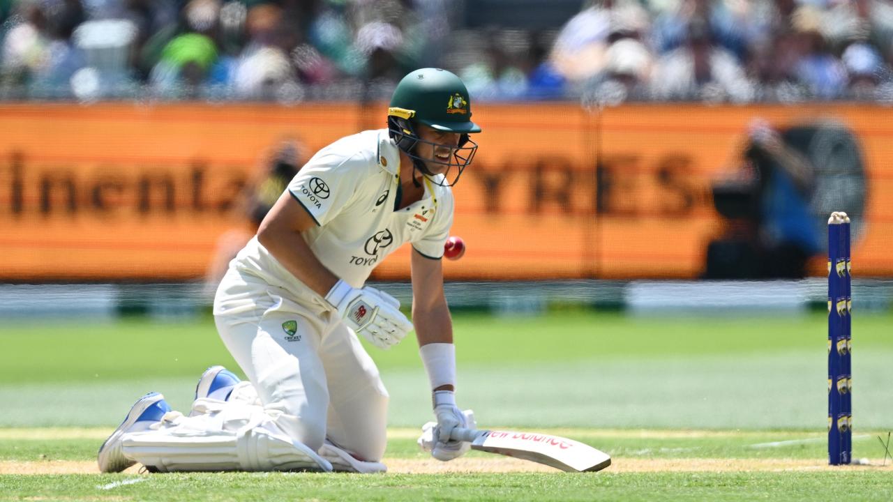 Pat Cummins floored by a bouncer – and shortly after was dismissed for 13. Picture: Getty