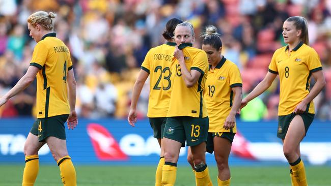 Tameka Yallop and her Matildas teammates look on after full-time. Picture: Getty Images