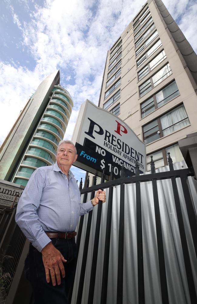 President apartment building is falling apart , concrete cancer, broken lifts and the pool in need of repair. Body corporate President and owner Graham Spottiswood in front of the building. Picture Glenn Hampson