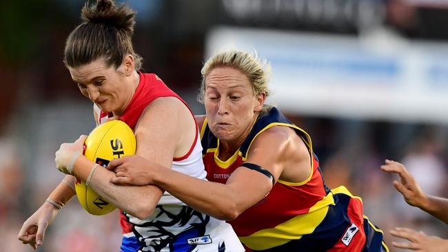 Marijana Rajcic of the Adelaide chases down Kirsten McLeod of the Western Bulldogs. Picture: AAP Image/Mark Brake