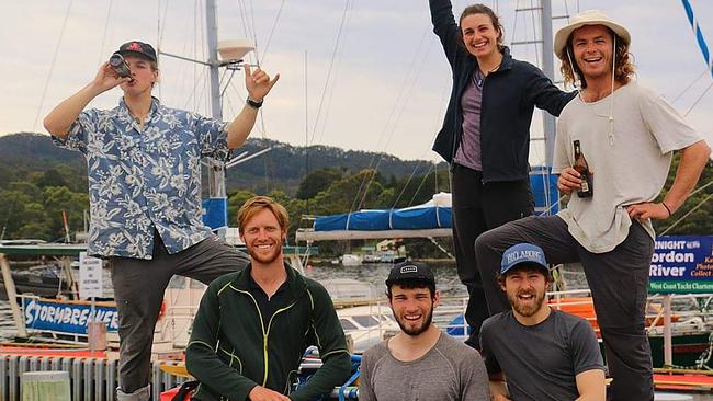 Felix Beck-Swindale form Hobart has not given up on his good friend Will Mainprize who was lost at sea when the live export ship he was on capsized in a typhoon in the East China Sea in September 2020. Will Mainprize, back right, and Felix Beck-Swindale, front right, celebrate after completing a rafting trip on the Franklin River. Picture: SUPPLIED