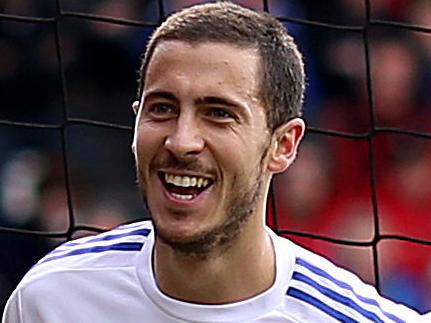 Chelsea's Eden Hazard celebrates scoring his side's fourth goal of the game during the English Premier League soccer match between AFC Bournemouth and Chelsea FC at the Vitality Stadium in Bournemouth, England. Saturday April 23, 2016. (Steve Paston /PA via AP) UNITED KINGDOM OUT - NO SALES - NO ARCHIVES