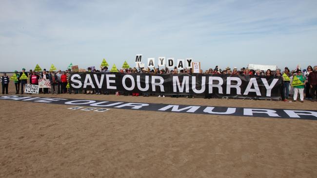 Protesters at the Murray Mouth, campaigning to protect the water promised for the river system.