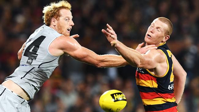 Andrew Phillips of the Blues competes against Sam Jacobs of the Crows.