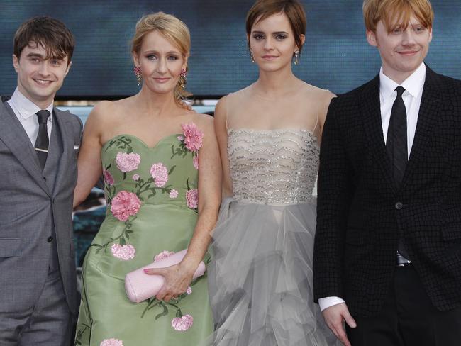 JK Rowling, pictured with the cinematic stars of Harry Potter, Daniel Radcliffe, Emma Watson and Rupert Grint in 2011. Picture: AP Photo/Joel Ryan