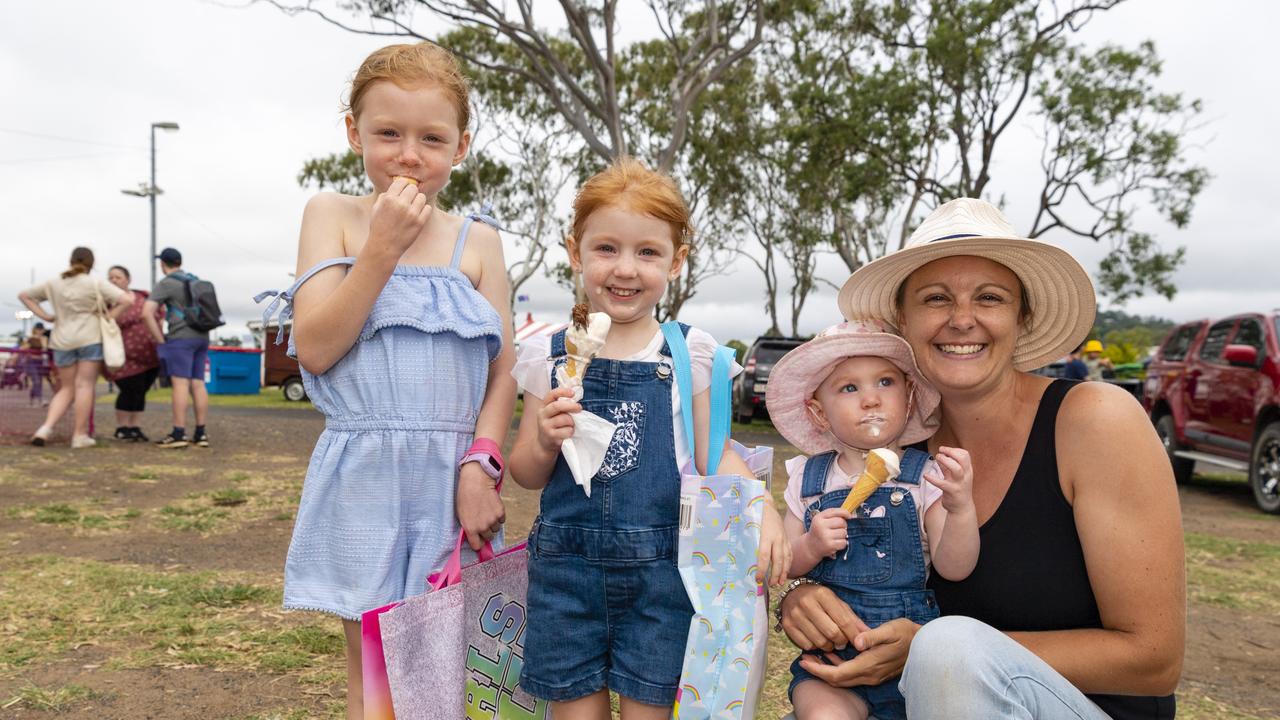 Enjoying ice cream are (from left) Macee, Scarlett and Harriet Lloyd with mum Anglea Thiess at the 2022 Toowoomba Royal Show, Friday, March 25, 2022. Picture: Kevin Farmer